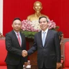 Trưởng Ban Kinh tế Trung ương Nguyễn Văn Bình tiếp Lãnh đạo tập đoàn Dell EMC do ông Anothai Wettayakorn làm trưởng đoàn. (Ảnh: Phương Hoa/TTXVN)