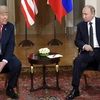 Tổng thống Mỹ Donald Trump (trái) và người đồng cấp Nga Vladimir Putin tại cuộc gặp ở Helsinki, Phần Lan ngày 16/7. (Nguồn: THX/TTXVN)