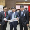 Thứ trưởng Thường trực Bộ Ngoại giao Bùi Thanh Sơn (giữa) và các đại biểu dự Hội nghị Ngoại vụ toàn quốc lần thứ 19. (Ảnh: Lâm Khánh/TTXVN)