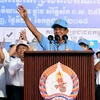 Thủ tướng Campuchia Samdech Techo Hun Sen (giữa) trong chiến dịch vận động tranh cử tại Phnom Penh. (Nguồn: AFP/TTXVN)