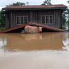 Ngập lụt sau sự cố vỡ đập thủy điện Xe Pian-Xe Namnoy ở Attapeu. (Nguồn: EPA/TTXVN)