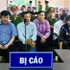 Tòng Thiên Mã (ngồi đầu từ bên trái qua) tại tòa chờ hội đồng xét xử tuyên án. (Ảnh: Thanh Sang/TTXVN)