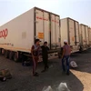 Xe tải chở hàng của Syria đỗ tại Mafraq thuộc Jordan, gần cửa khẩu Nassib giữa Syria và Jordan. (Nguồn: THX/TTXVN)