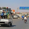 Người dân Syria sơ tán đến khu vực an toàn để tránh chiến sự ở phía bắc tỉnh Idlib ngày 6/9. (Nguồn: AFP/TTXVN)