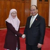 Thủ tướng Nguyễn Xuân Phúc tiếp Phó Thủ tướng Malaysia Wan Azizah. (Ảnh: Thống Nhất/TTXVN)