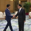 Thủ tướng Nhật Bản Shinzo Abe và Thủ tướng Trung Quốc Lý Khắc Cường. (Nguồn: AP)