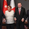 (Từ trái) Tổng thống Nga Vladimir Putin, Thủ tướng Đức Angela Merkel, Tổng thống Thổ Nhĩ Kỳ Recep Tayyip Erdogan và Tổng thống Pháp Emmanuel Macron tại cuộc họp báo chung ở Istabul. (Nguồn: AFP/TTXVN)