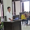 Bị cáo Dương Hoàng Thanh tại phiên tòa sơ thẩm. (Ảnh: Lê Đức Hoảnh/TTXVN)