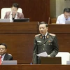 Bộ trưởng Bộ Công an Tô Lâm phát biểu làm rõ một số vấn đề đại biểu Quốc hội nêu. (Ảnh: Doãn Tấn/TTXVN)