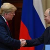 Tổng thống Mỹ Donald Trump (trái) trong cuộc họp báo chung với Tổng thống Nga Vladimir Putin sau cuộc gặp thượng đỉnh ở Helsinki, Phần Lan ngày 16/7. (Nguồn: AFP/TTXVN)