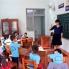 Lớp học của các em học sinh câm, điếc bẩm sinh tại Trung tâm hỗ trợ phát triển giáo dục hòa nhập tỉnh Đắk Nông. (Ảnh: Hưng Thịnh/TTXVN)