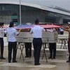 Lễ trao trả hài cốt quân nhân Mỹ mất tích trong chiến tranh ở Việt Nam tại sân bay quốc tế Đà Nẵng. (Ảnh: Trần Lê Lâm/TTXVN)
