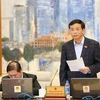 Tổng Thư ký Quốc hội Nguyễn Hạnh Phúc trình bày các báo cáo Tổng kết Kỳ họp thứ 6 và cho ý kiến bước đầu về việc chuẩn bị Kỳ họp thứ 7 của Quốc hội. (Ảnh: Dương Giang/TTXVN)