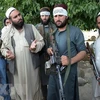 Các tay súng Taliban tại khu vực ngoại ô Jalalabad. (Nguồn: AFP/TTXVN)