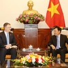 Phó Thủ tướng, Bộ trưởng Bộ Ngoại giao Phạm Bình Minh tiếp Đại sứ Hoa Kỳ tại Việt Nam. (Ảnh: Dương Giang/TTXVN)