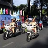 Lực lượng cảnh sát giao thông Thành phố Hồ Chí Minh xuất quân hưởng ứng lễ phát động ra quân thực hiện nhiệm vụ năm An toàn giao thông 2019. (Ảnh: Hoàng Hải/TTXVN)
