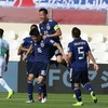 Các cầu thủ Nhật Bản ăn mừng bàn thắng trước đội tuyển Saudi Arabia. (Ảnh: Hoàng Linh/TTXVN)