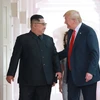 Trong ảnh (do Hãng thông tấn Trung ương Triều Tiên đăng phát): Nhà lãnh đạo Triều Tiên Kim Jong-un (trái) trong cuộc gặp thượng đỉnh với Tổng thống Mỹ Donald Trump tại Singapore ngày 12/6/2018. (Nguồn: EPA/TTXVN)