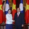 Thủ tướng Nguyễn Xuân Phúc tiếp Chủ tịch Quốc hội Lào Pany Yathotou. (Ảnh: Thống Nhất/TTXVN)