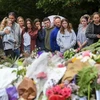 Người dân tưởng niệm các nạn nhân thiệt mạng trong vụ xả súng tại Christchurch, New Zealand. (Nguồn: THX/TTXVN)