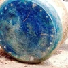 Mặt trống đồng được tìm thấy ở Lào Cai. (Nguồn: Báo Lào Cai)