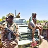 Binh sỹ quân đội Sudan gác gần khu vực trụ sở Bộ Quốc phòng ở thủ đô Khartoum. (Nguồn: AFP/TTXVN)