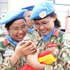 Nữ sỹ quan của Việt Nam lên đường thực thi các nhiệm vụ gìn giữ hòa bình tại Cộng hòa Trung Phi và Nam Sudan. (Ảnh: TTXVN)