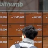 Bảng tỷ giá tại sàn giao dịch tiền ảo Bithumb ở thủ đô Seoul, Hàn Quốc. (Nguồn: EPA-EFE/TTXVN)