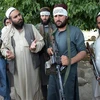 Các tay súng Taliban tại khu vực ngoại ô Jalalabad, Afghanistan. (Nguồn: AFP/TTXVN)
