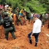 Lực lượng cứu hộ tìm kiếm nạn nhân tại hiện trường vụ lở bùn ở Barrancabermeja, Colombia tháng10/2018. (Nguồn: Reuters/TTXVN)