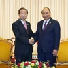 Thủ tướng Nguyễn Xuân Phúc tiếp ông Toshihiro Nikai, Tổng Thư ký Đảng Dân chủ Tự do của Nhật Bản (LDP), đồng thời là Chủ tịch Liên minh nghị sỹ Nhật-Việt. (Ảnh: Thống Nhất/TTXVN)