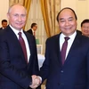 Thủ tướng Nguyễn Xuân Phúc hội kiến Tổng thống Nga Vladimir Putin. (Ảnh: Thống Nhất/TTXVN)