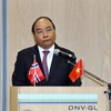 Thủ tướng Nguyễn Xuân Phúc phát biểu tại Diễn đàn Doanh nghiệp Việt Nam-Na Uy. (Ảnh: Thống Nhất/TTXVN)