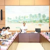 Đoàn Đại biểu Quốc hội các tỉnh Long An, Bình Thuận và thành phố Cần Thơ thảo luận ở tổ. (Ảnh: Trọng Đức/TTXVN)