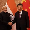 Thủ tướng Ấn Độ Narendra Modi (trái) trong cuộc gặp Chủ tịch Trung Quốc Tập Cận Bình bên lề Hội nghị thượng đỉnh Nhóm các nền kinh tế lớn mới nổi (BRICS) lần thứ 10 ở Johannesburg, Nam Phi tháng 7/2018. (Nguồn: AFP/TTXVN)