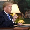 Tổng thống Mỹ Donald Trump phát biểu với báo giới sau khi ký sắc lệnh trừng phạt Iran, tại Nhà Trắng ngày 8/5/2018. (Nguồn: AFP/TTXVN)