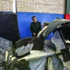 Mảnh vỡ chiếc máy bay không người lái RQ-4A Global Hawk của Mỹ bị hệ thống phòng không Iran bắn hạ ngày 20/6. (Nguồn: AFP/TTXVN)