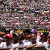 Người dân tham dự một sự kiện trên sân vận động Mahamasina. (Nguồn: AFP)