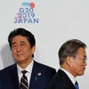 Thủ tướng Nhật Bản Shinzo Abe và Tổng thống Hàn Quốc Moon Jae-In tại Hội nghị Thượng đỉnh G20 ở Osaka. (Nguồn: Getty Images)