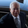 Cựu Thủ tướng Malaysia Najib Razak tới tòa án ở Kuala Lumpur ngày 15/4. (Nguồn: AFP/TTXVN)
