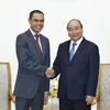Thủ tướng Nguyễn Xuân Phúc tiếp Đại sứ đặc mệnh toàn quyền Malaysia tại Việt Nam Zamruni Khalid chào từ biệt kết thúc nhiệm kỳ công tác tại Việt Nam. (Ảnh: Thống Nhất/TTXVN)