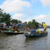 Người dân buôn bán trên sông Mekong. (Nguồn: fishbio.com)