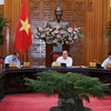 Thủ tướng Nguyễn Xuân Phúc chủ trì cuộc họp. (Ảnh: Dương Giang/TTXVN)