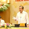 Phó Thủ tướng Thường trực Trương Hòa Bình chủ trì hội nghị. (Ảnh: Dương Giang/TTXVN)