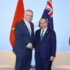 Thủ tướng Nguyễn Xuân Phúc gặp Thủ tướng Australia Scott Morrison bên lề Hội nghị Cấp cao ASEAN lần thứ 33 và các hội nghị cấp cao liên quan tại Singapore tháng 11/2018. (Ảnh: Thống Nhất/TTXVN)