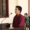 Bị cáo Nguyễn Tuấn Trung tại phiên tòa. (Ảnh: Đậu Tất Thành/TTXVN)