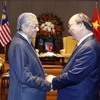 Thủ tướng Nguyễn Xuân Phúc và Thủ tướng Malaysia Mahathir Mohamad. (Ảnh: Thống Nhất/TTXVN)