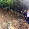 Điểm sạt lở đất tại xã Đồng Chum. (Ảnh: Thanh Hải/TTXVN)