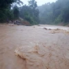 Mưa lớn gây ngập lụt tại huyện miền núi Thường Xuân. (Ảnh: Đình Nam/TTXVN)