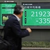 Bảng tỷ giá chứng khoán tại Tokyo, Nhật Bản. (Ảnh: Kyodo/TTXVN)